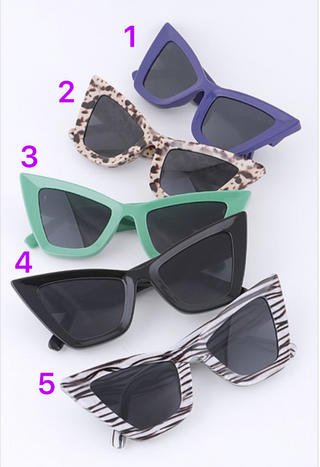 Cat eye sunglasses. Cat eye shades. Pointy cat eye sunglasses. Vibrant sunglasses. Retro sunglasses. Fashion sunglasses. Stylish sunglasses.