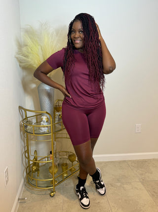 Discover the ultimate in style and comfort with our women's clothing two-piece biker short set. Top and bottom in solid burgundy, crafted from 95% poly and 5% spandex for a stretchy, perfect fit. Ideal for every busy mom on the go!